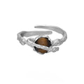 Women's adjustable Saturn Tigereye open ring in silver electroplated white gold colour.