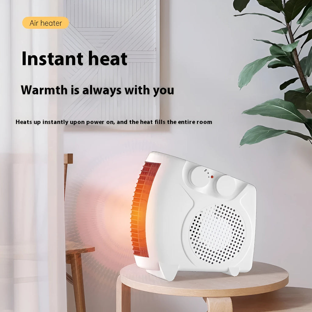 White compact electric desktop heater with power controls and grille, shown on a wooden desk.