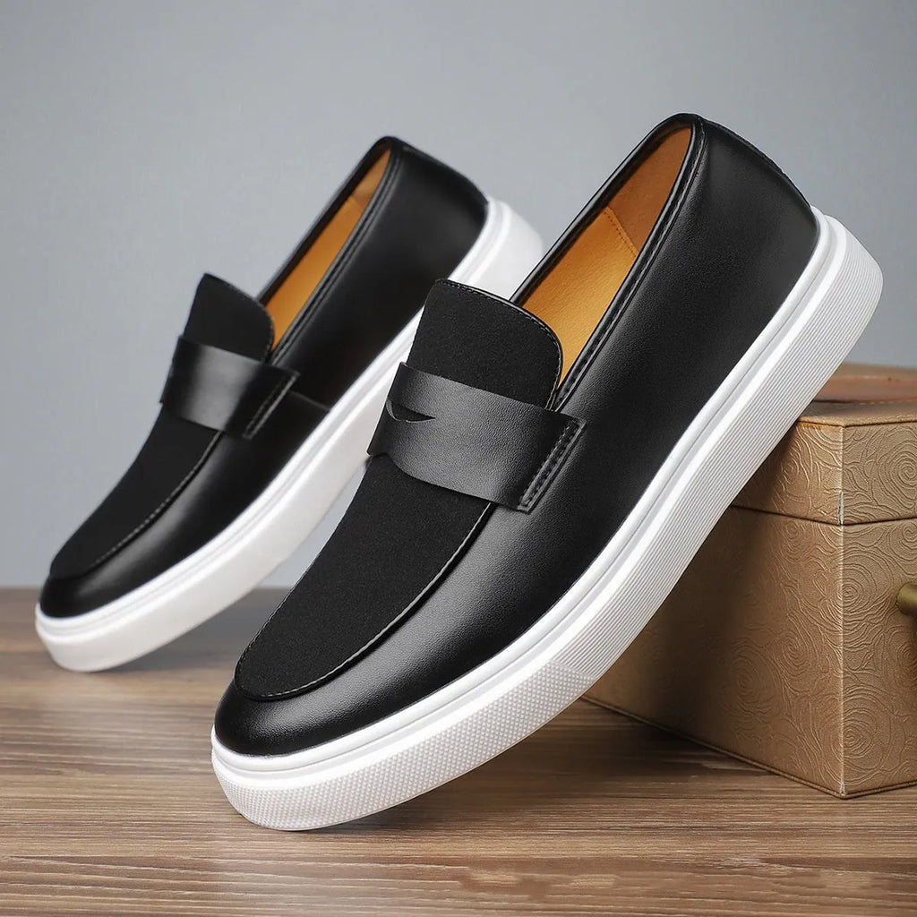 Black men's slip-on casual shoes with tassel detail, round toe and rubber sole