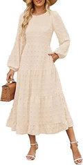 Women's long sleeve high waist dress with ruffled sleeves in a solid colour.