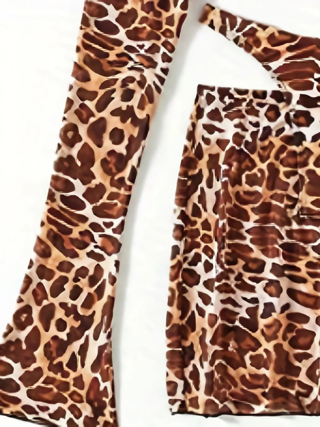 Women's leopard print split bikini swimsuit set with adjustable halter top, high-waisted bottom, and matching skirt
