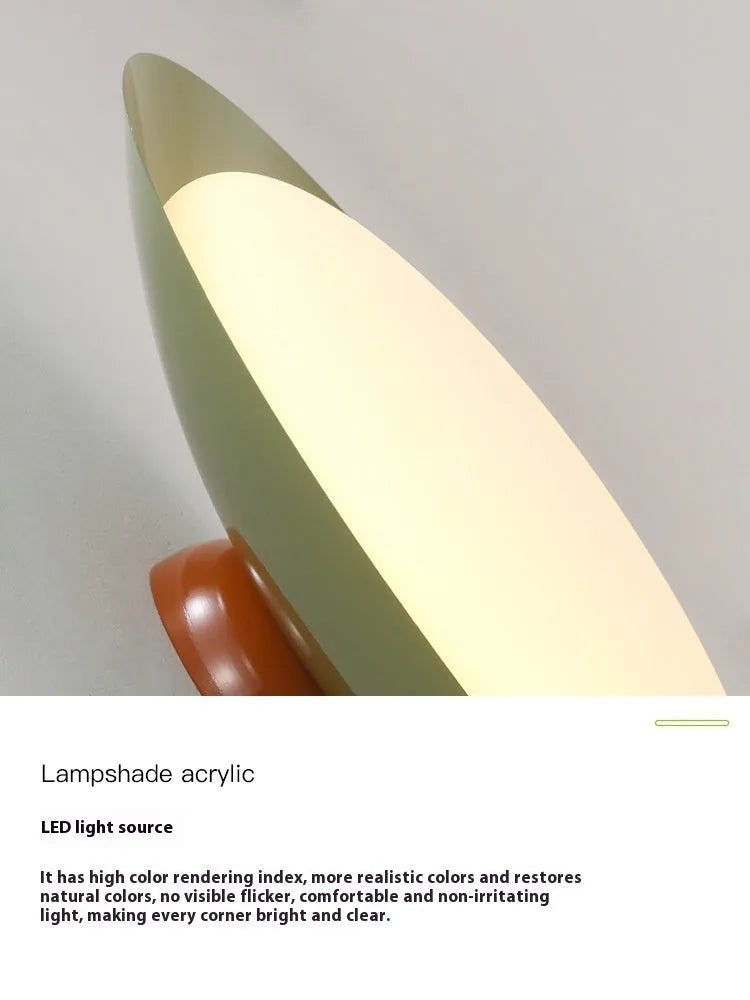 Modern cream-style flying saucer ceiling lamp in a minimalist room setting.