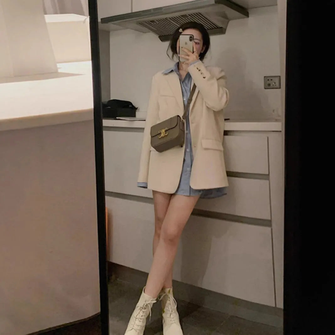 Korean-style solid colour polyester street suit jacket with long sleeves and pockets.