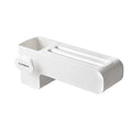 White plastic kitchen knife rack organiser with modern simple design on a countertop.