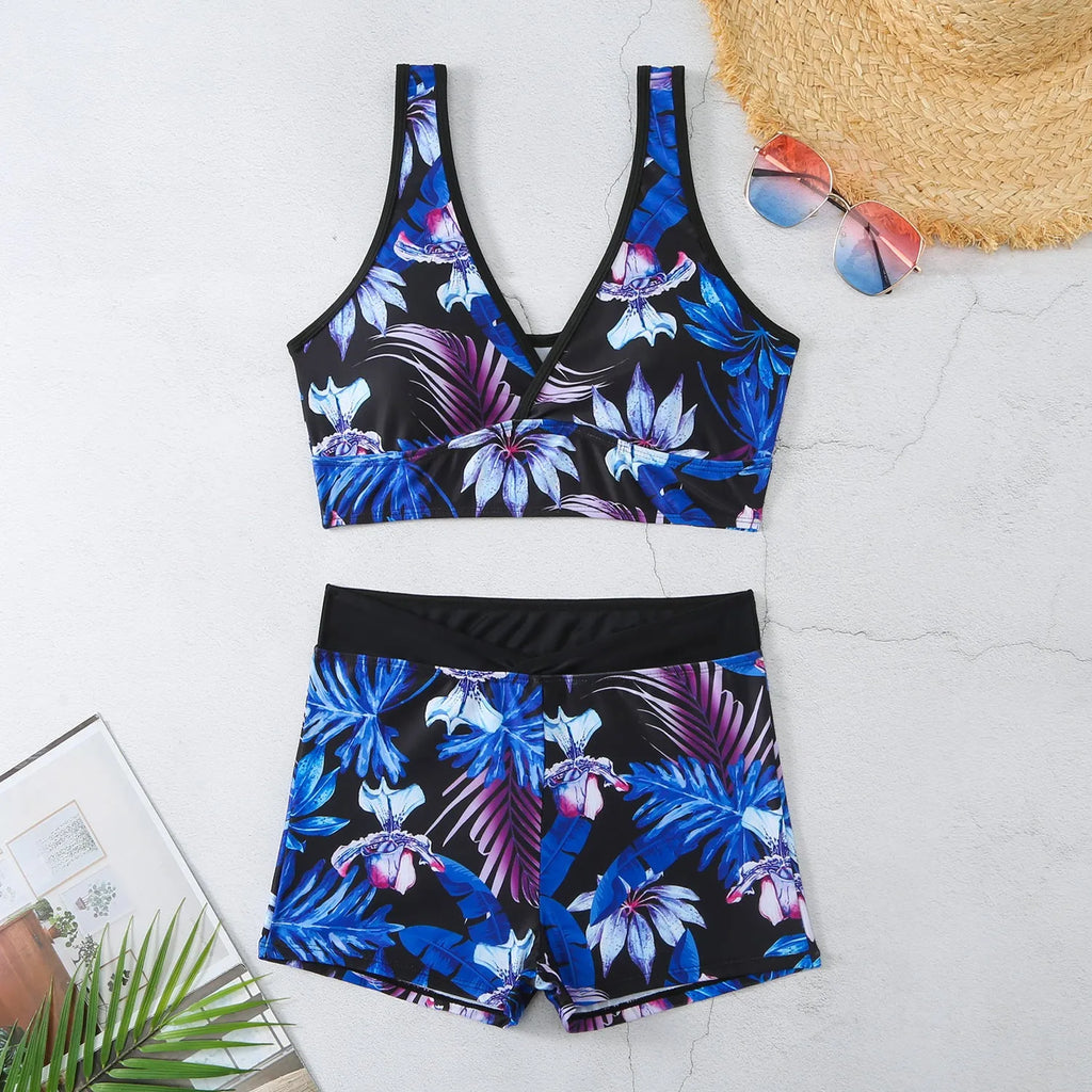 Women's two-piece swimsuit with printed boxer briefs and sleeveless top in multiple colours.