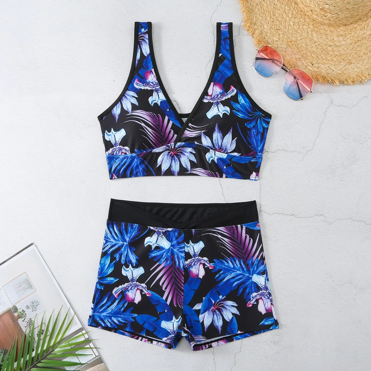 Women's two-piece swimsuit with printed boxer briefs and sleeveless top in multiple colours.