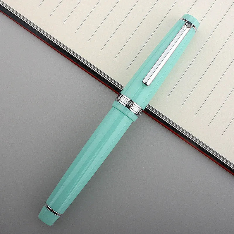 Resin business pen with stainless steel nib shown in a selection of colour and clip finish options.