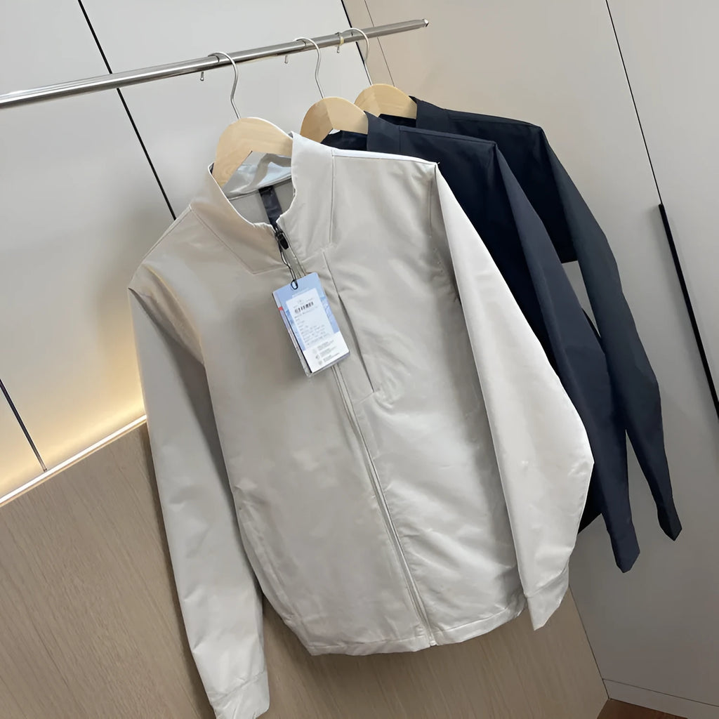 Men's stand collar casual jacket in polyester available in black, dark blue, and milky white