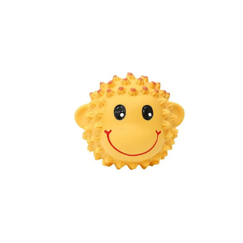 Orange and yellow spiky latex dog toys with a squeaker, shown next to a measuring tape indicating 3 inch diameter.