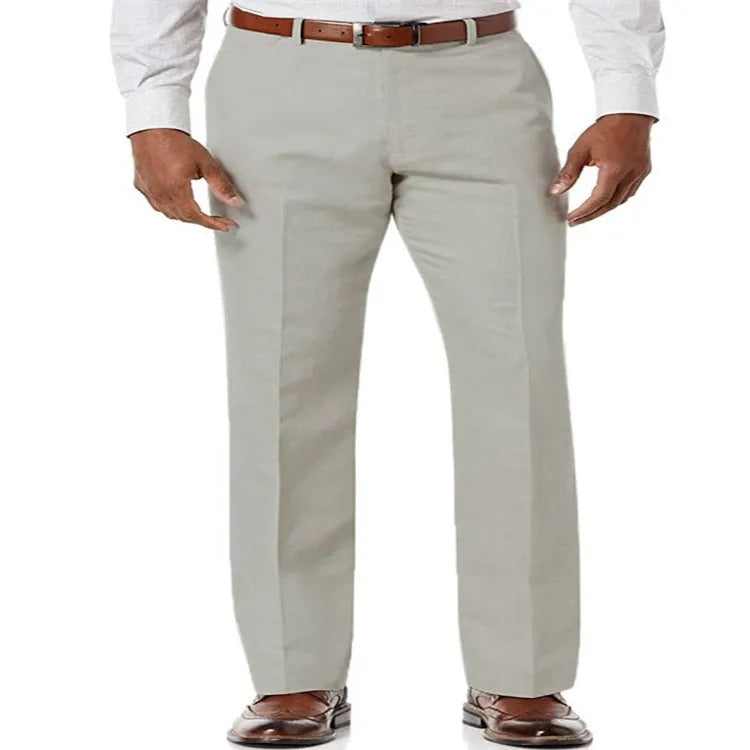 Men's solid colour linen cotton casual trousers with slant pockets laid flat.