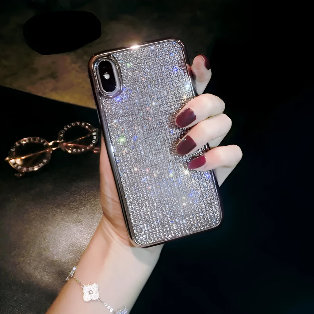 Silver glitter diamond pattern silicone phone case with crystals for iPhone.