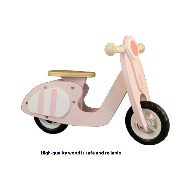 Pink wooden toddler balance scooter for children aged 1-6 years.
