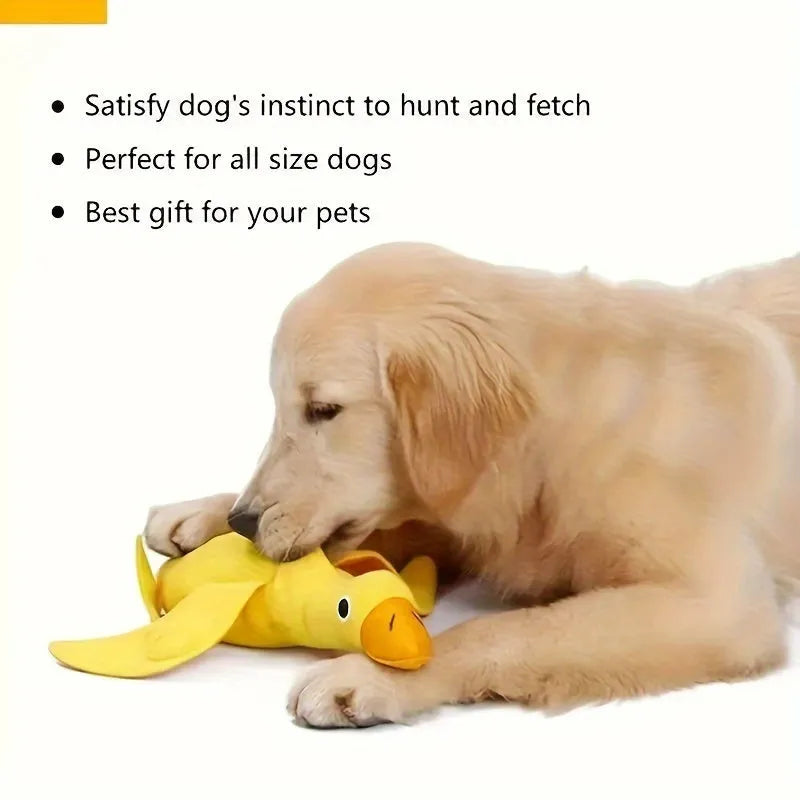 Yellow plush teddy bear dog toy with an attached duck doll, featuring a squeaker and treat compartment.