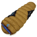 Cotton camping sleeping bag in Army Green with its compression storage bag.