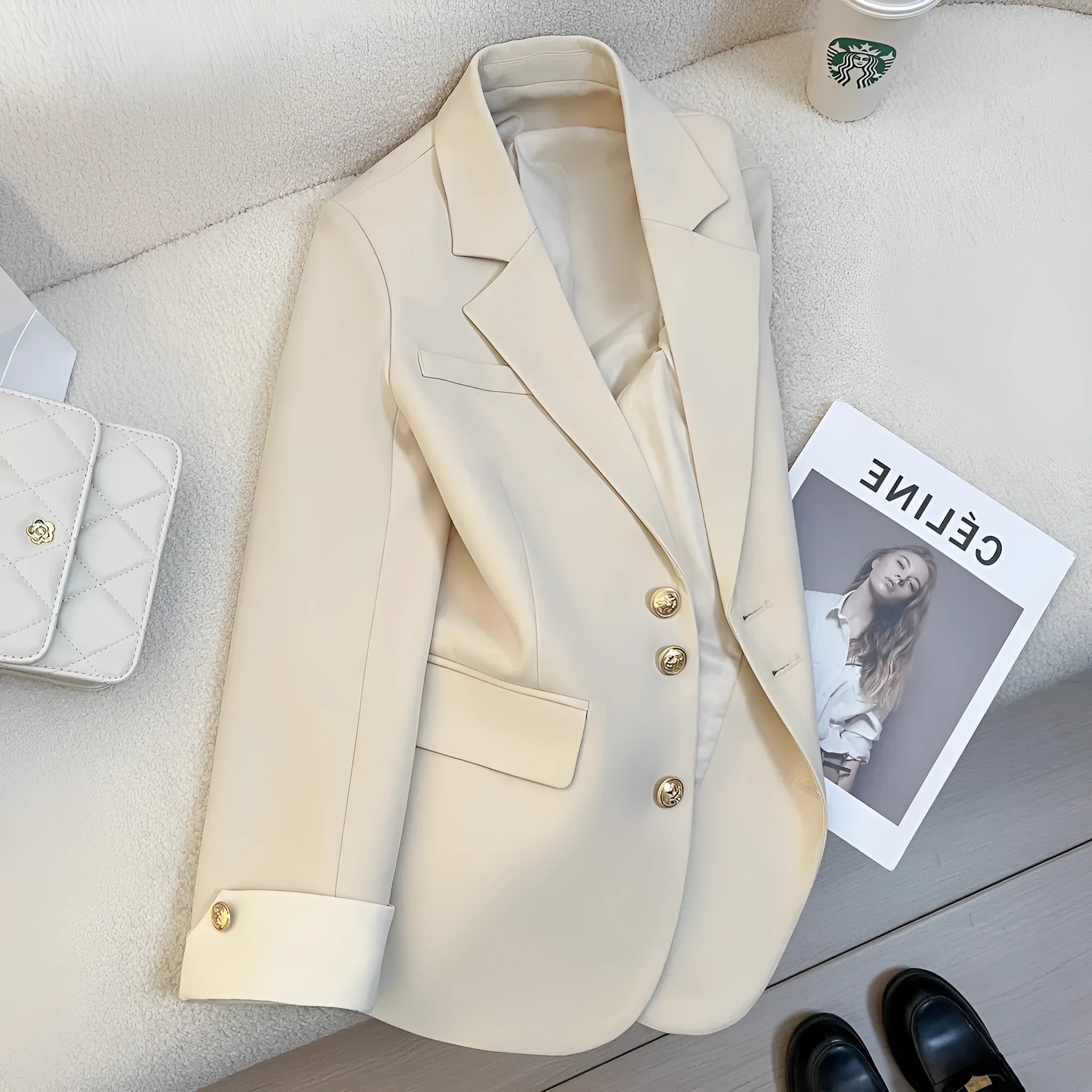 Korean style loose fit women's coat in milky white, showing long sleeves and pockets.