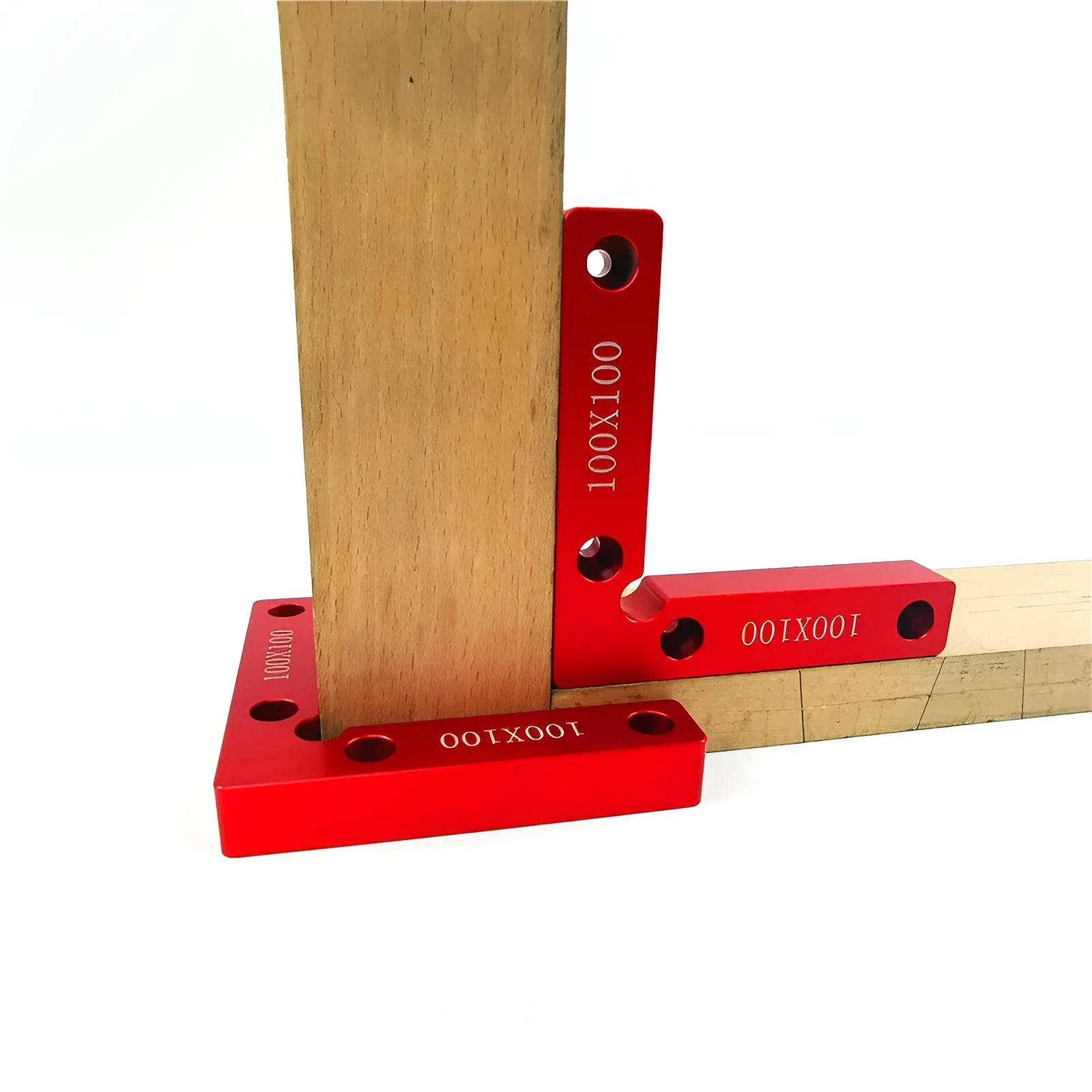 Aluminium right angle positioning block for woodworking jigsaw on a workbench.