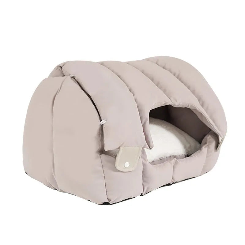 Grey arched fully enclosed cat nest bed with soft sofa exterior, shown next to a green one.