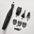 Men's black electric trimmer with reciprocating head, three positioning combs, and cleaning brush for beard and nose hair grooming