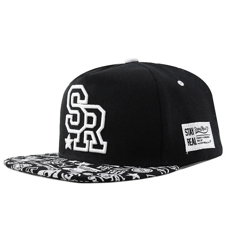 Cotton baseball hat with embroidered lettering in black colour showing adjustable strap