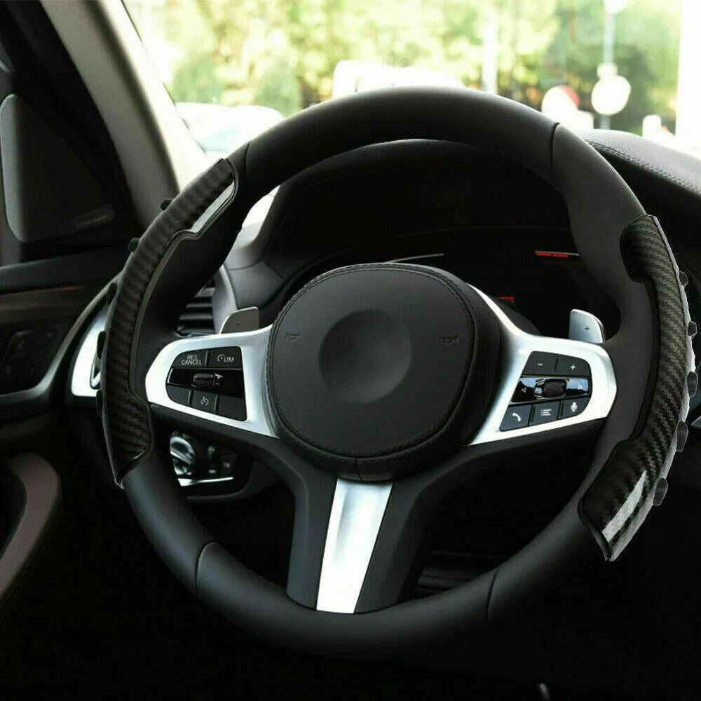 Carbon fibre black anti-skid steering wheel sleeve for cars with a 38cm diameter.