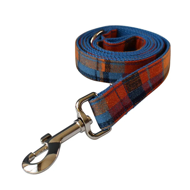 Blue velvet plaid cotton dog collar with alloy buckle and bow accessory on white background