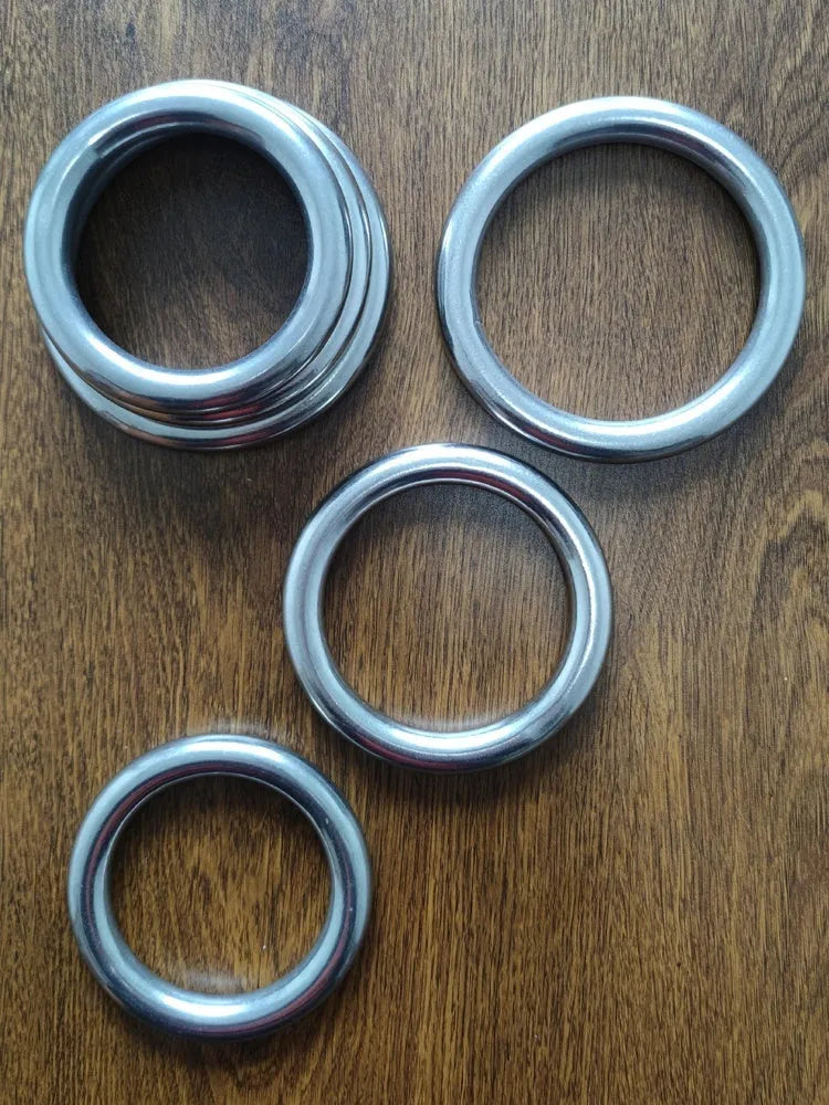 Silver electroplated carbon steel Wing Chun training ring for forearm conditioning.
