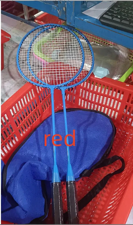 A pair of blue and red ultra-lightweight graphite alloy badminton rackets laid side by side.