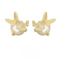 A pair of silver butterfly ear studs with animal zodiac design in gold or white gold colour.
