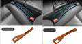 Black waterproof plastic car seat gap storage pocket with handle.
