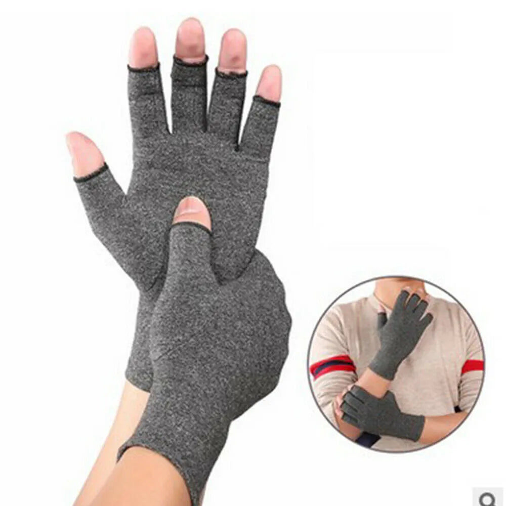 Grey half-finger compression gloves with anti-slip palm grips, shown in a flat lay.