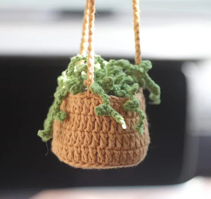 Green and white knitted wool car plant decoration with 8cm base and 25cm hanging rope