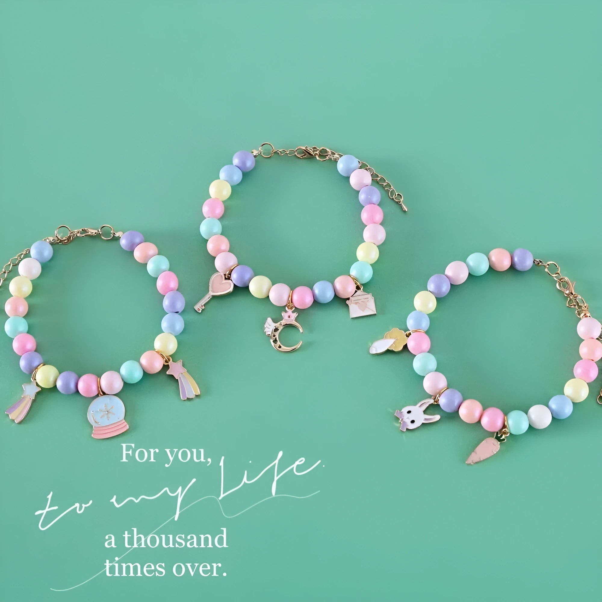 Colourful resin pearl collar and bracelet set for a small dog, shown in a macaron colour option.