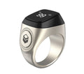 Zikr1 silver smart ring on a finger showing its OLED display and single button.