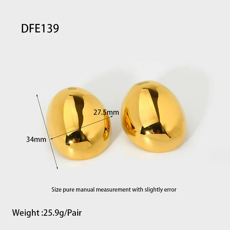 Geometric stainless steel ear studs with exaggerated glazed surface finish in DFE139 colour
