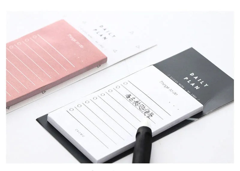 Planning notepad with 50 sheets of 80g paper in pink or red cover, showing 10x6cm page size