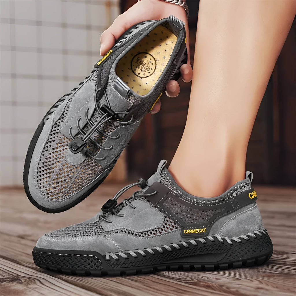 Men's brown suede casual tennis shoes with an elastic band and hand-stitched rubber sole.