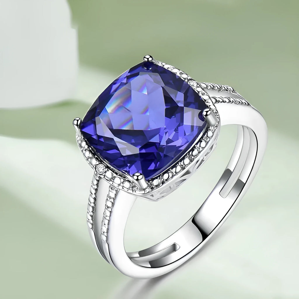 Women's sterling silver ring with a blue tanzanite gemstone.