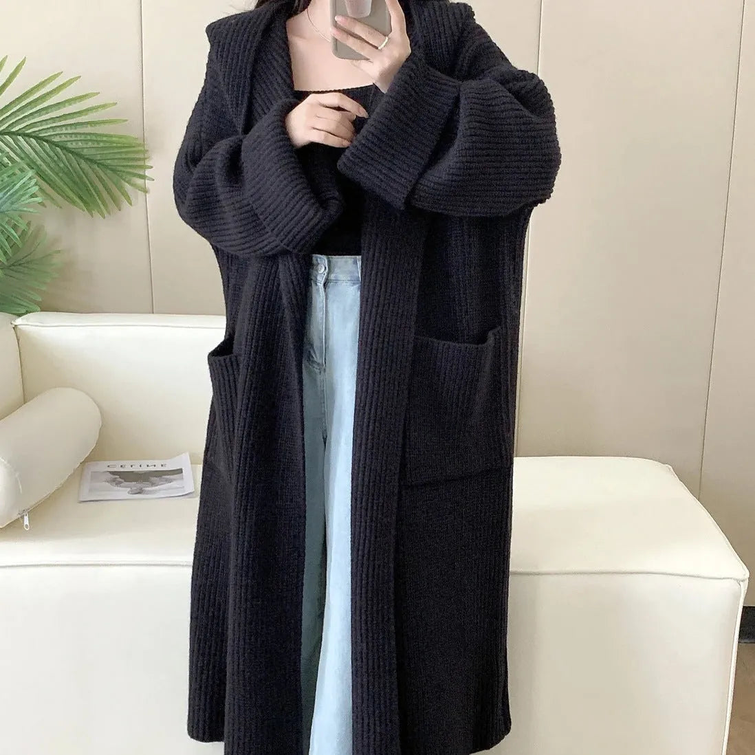Loose grey hooded cardigan coat for women with raglan sleeves, shown open as an oversized layer.