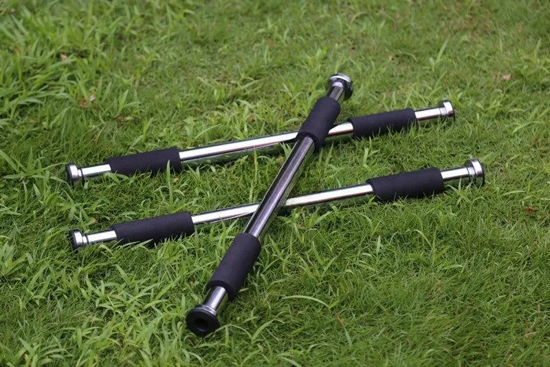 Steel adjustable indoor pull-up bar extended for door frame fitness training.