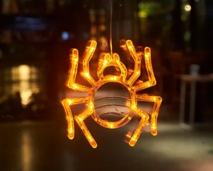 Halloween window hanging LED lights with ghost, spider, and pumpkin designs