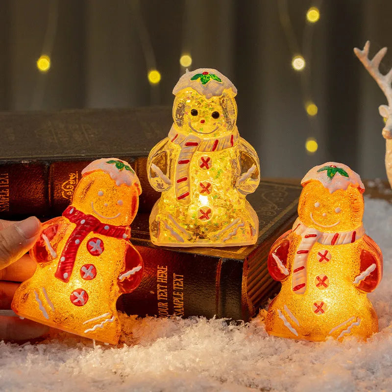 Glowing plastic gingerbread man snowman Christmas ornament with scarf in one of four colour options.