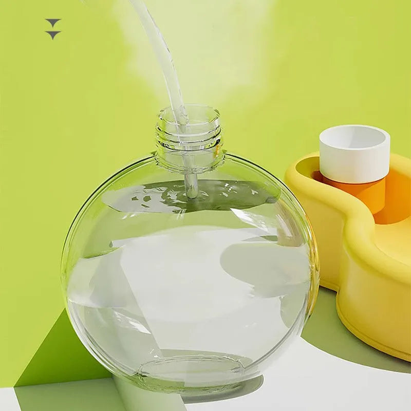 Green dog travel water bottle with built-in drinking bowl extended