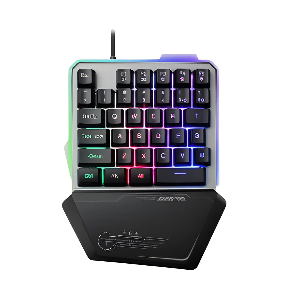 Black one-handed mechanical gaming keyboard with RGB backlit keys on a desk.