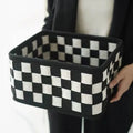 Checkerboard pattern folding felt storage basket showing collapsible sides and 37x29x19.5cm size.
