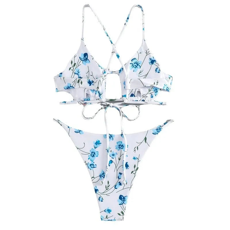 Women's floral print swimsuit set with triangle tie-neck top and matching shorts