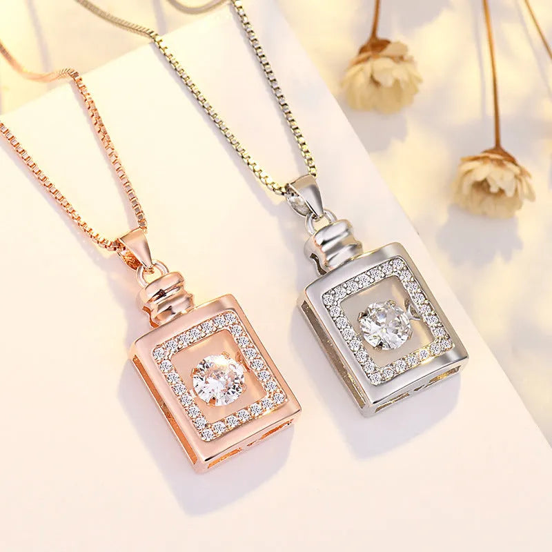 Silver love heart pendant necklace with crown and bow detail for women