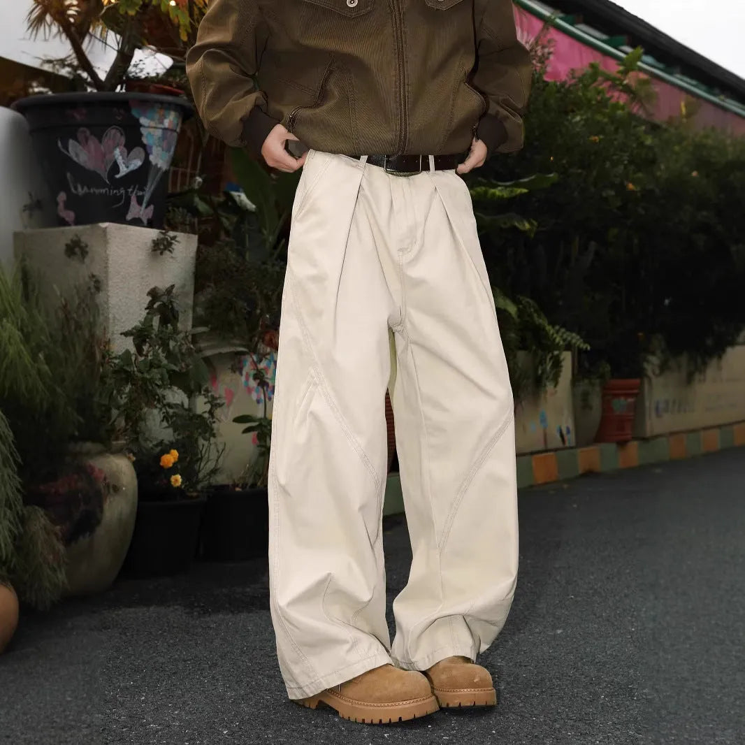 Men's straight-leg pleated trousers in black, brown, and apricot colours with mid-waist design