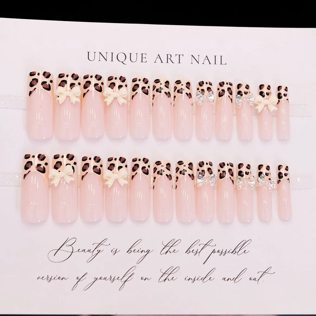 Leopard print false nails with butterfly designs in WM296 colour for women's manicure