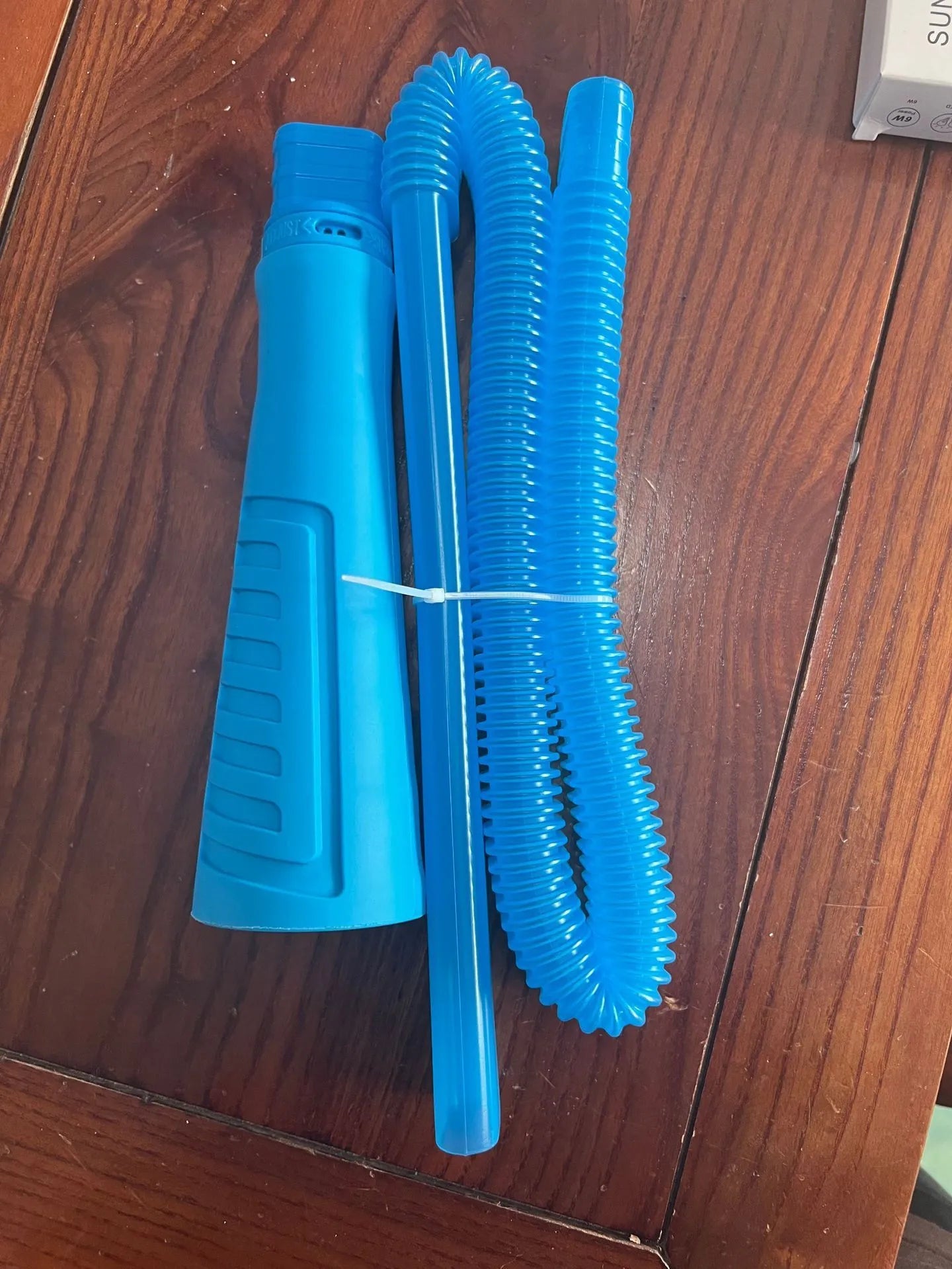 Blue washing machine vacuum cleaner suction pipe with round head measuring 114cm length