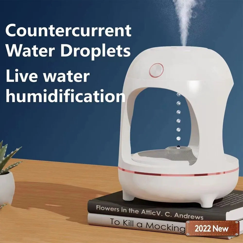 Rose gold and white ultrasonic humidifier with levitating water drop design and LED night light